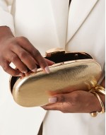 textured metallic clutch bag in gold