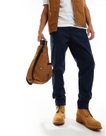 seasonal sling bag in brown