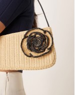 straw asymmetric shoulder bag with contrast stitch flower corsage in neutral