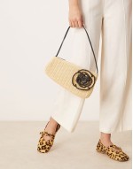 straw asymmetric shoulder bag with contrast stitch flower corsage in neutral