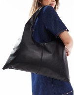 winged shoulder tote bag in black